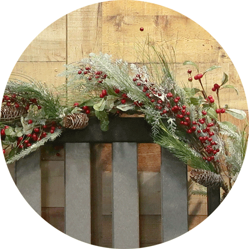 Iced Balsam garland on the back of a bench.